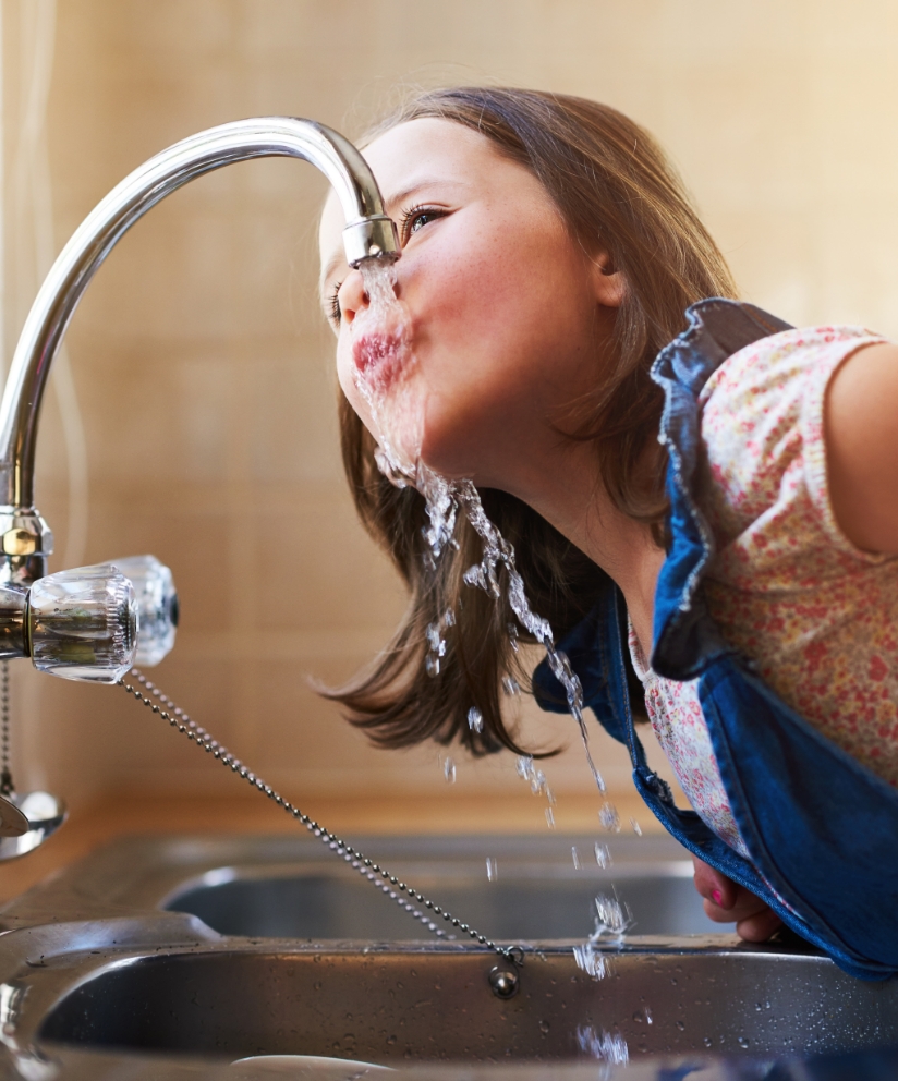 drinking from tap-Happy Tanks Northland